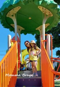 image of a mom with her daughter on a colorful playground